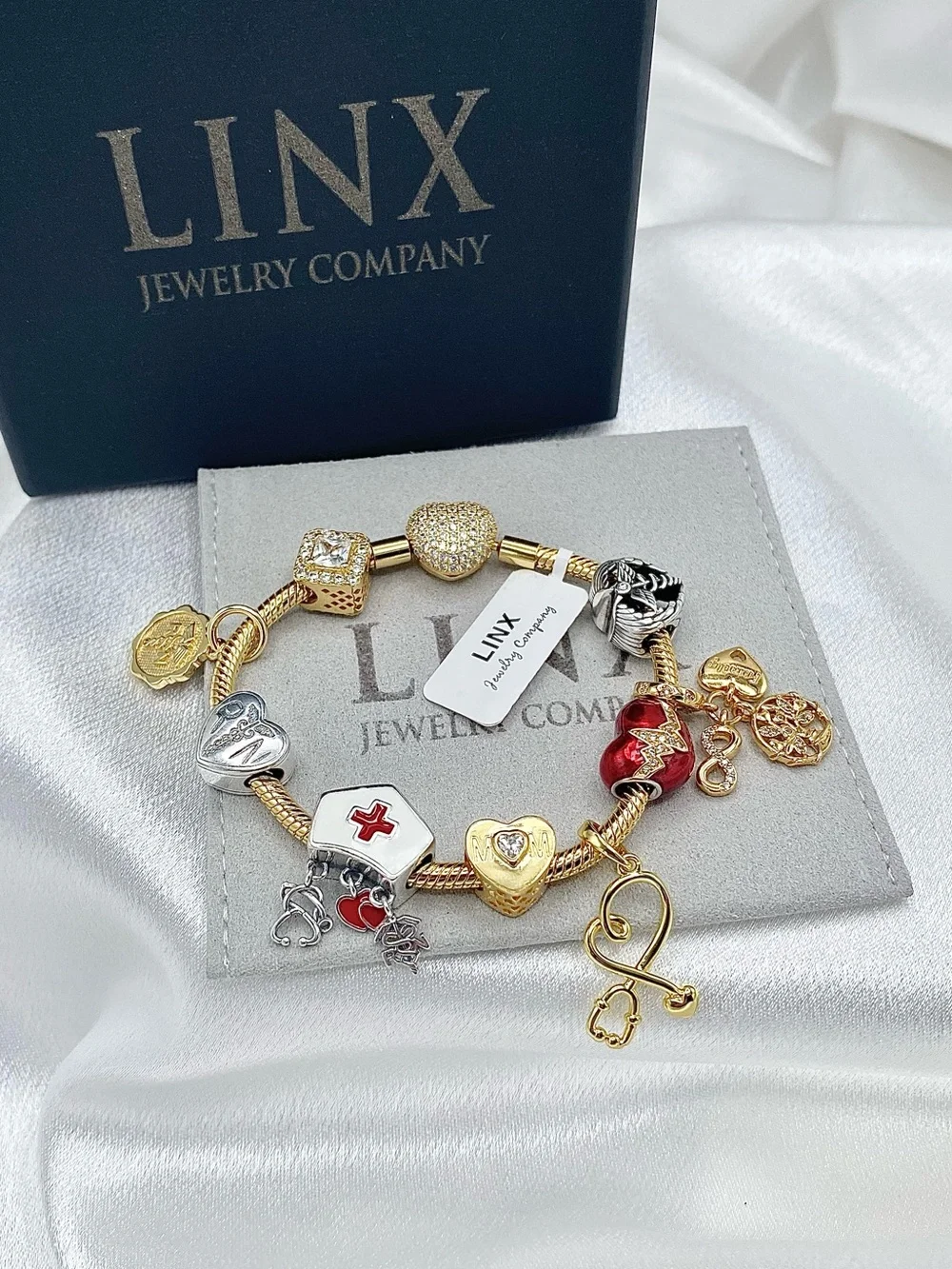 Linx Gold Snake Chain Charm Bracelet with Registered Nurse, Mom & Family Charms